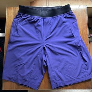 Lululemon Shorts 11" Inseam Medium, in Good Condition, color is Purple.